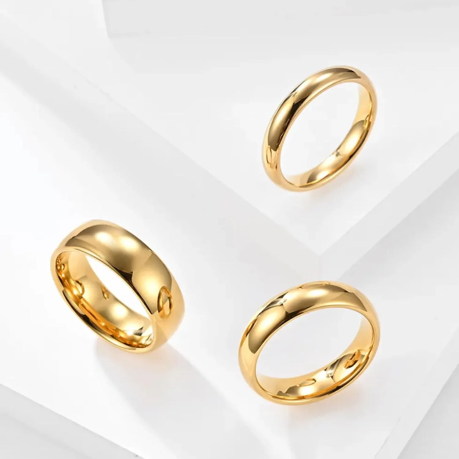 Gold Plated Tungsten Carbide Wedding Band Classic Half Dome. 2mm-10mm Widths Available. Some Rings Feature a Single Cubic Zirconia.